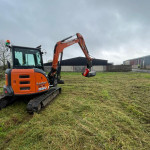 Mulcher tidying up a site